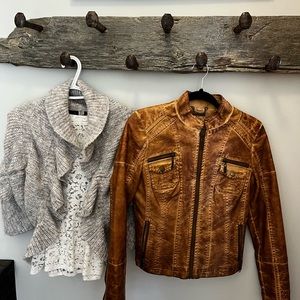 FAUX leather jacket, feels soft like real leather but it is not! Ladies small